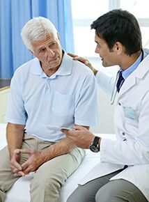 a patient with prostatitis during an appointment with a specialist